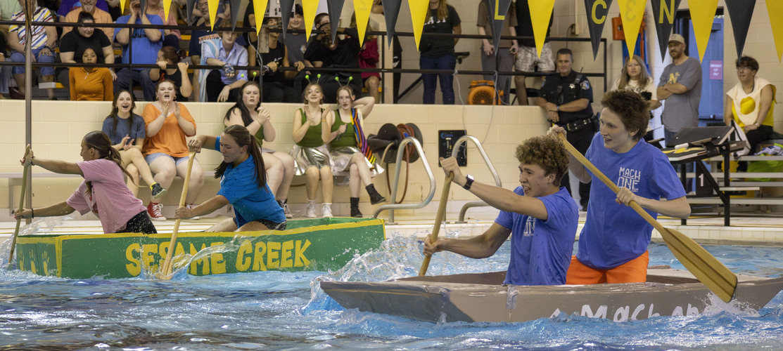 L'Anse Creuse High School - North students racing in the Annual Cardboard Boat Regatta