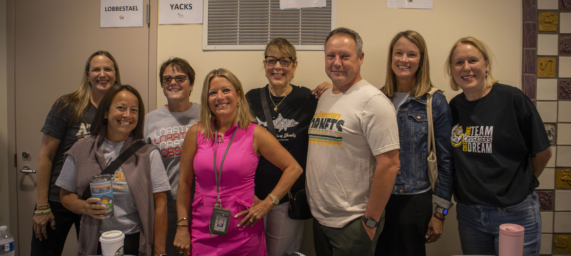 Staff smiling for picture together on Opening Day 2026